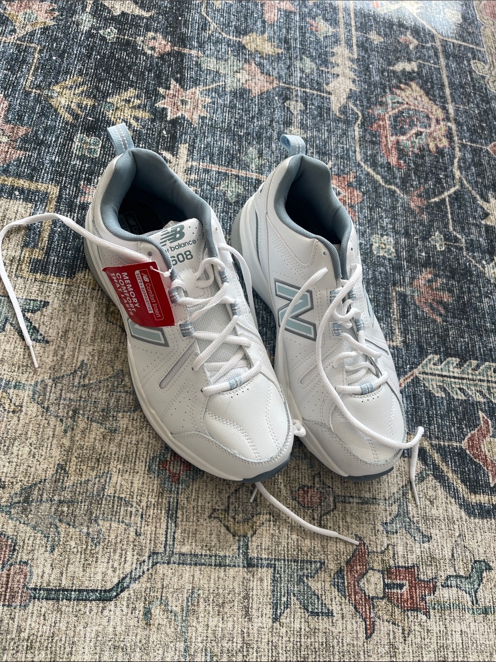New Balance White Sneakers with Light Gray and Blue Accents